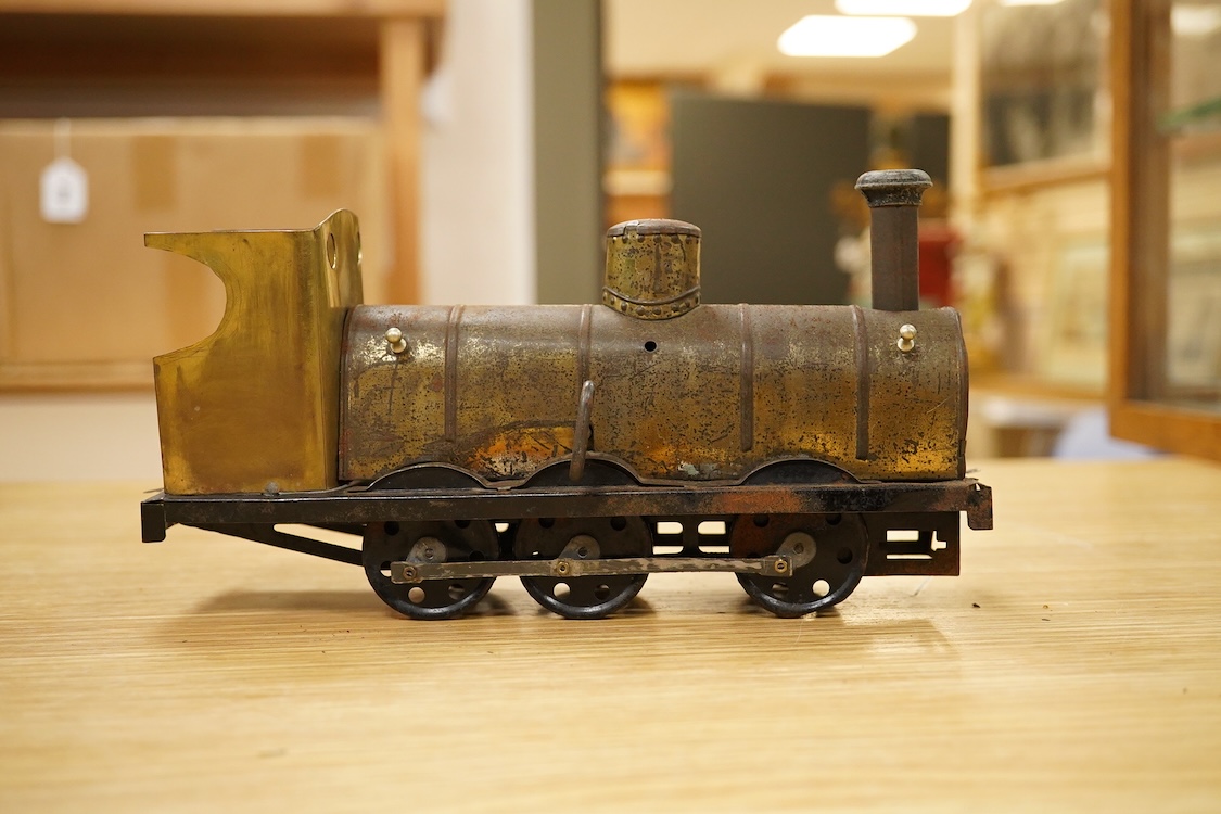 Seven Gauge One coarse scale railway freight wagons, by Bassett-Lowke, etc., including tinplate and wooden examples in liveries for LNWR, Midland Railway, and LBSCR, together with the remains of a scarce late 19th centur